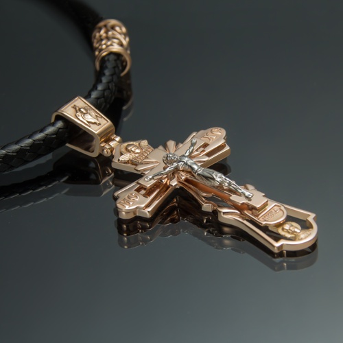 Крест на шнуре с золотыми выставками  от ювелирной фирмы "Стиль"